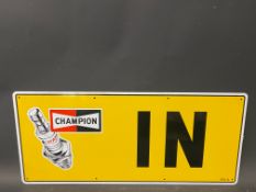 A new old stock Champion spark plug garage tin advertising sign 'In', 23 x 10