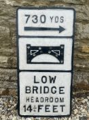 A 'Low Bridge Headroom 14 1/4 Feet' aluminium road sign, older repairs, 14 1/4 x 27 3/4