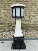 A small early octagonal road bollard, 39
