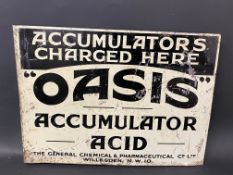 An unusual Oasis Accumulator Acid double sided tin advertising sign with hanging flange, 16 1/2 x