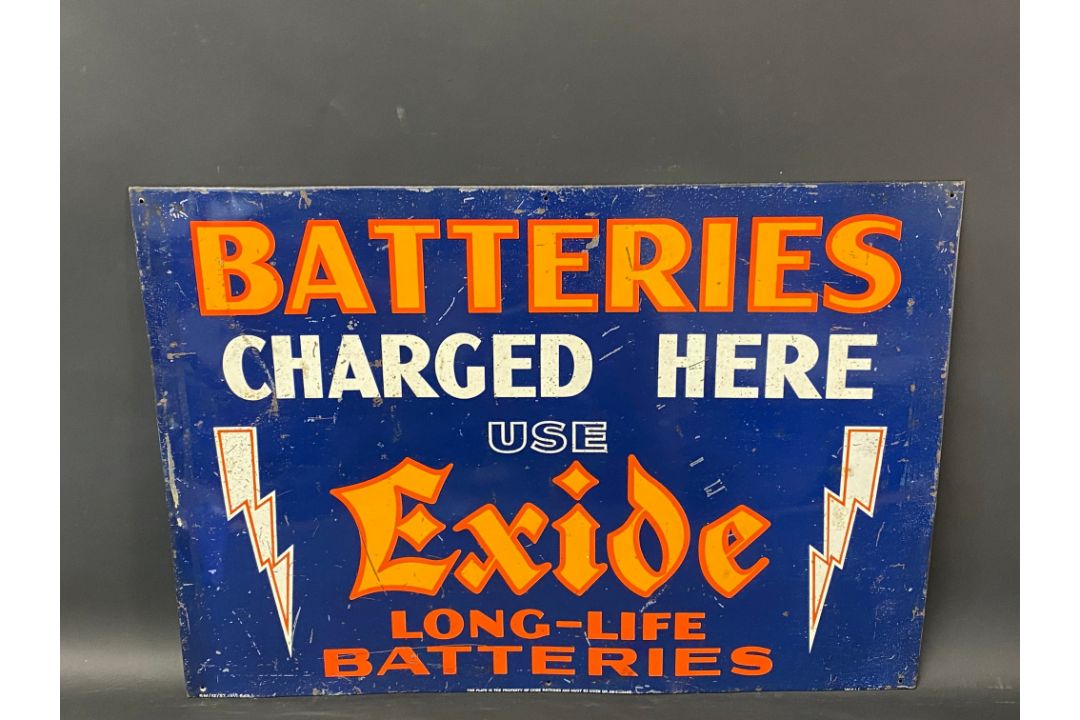 An Exide Batteries tin advertising sign of bright design and colour, 25 x 17 3/4". - Image 1 of 6