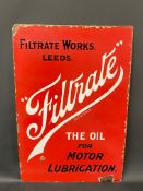 A Filtrate oils rectangular enamel sign, 14 1/4 x 21 1/4.