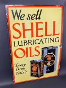 A Shell Lubricating Oils 'Every Drop Tells' pictorial enamel sign in very good condition, 24 x 36