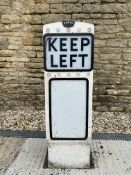 A Bergo Keep Left road bollard with reflective discs, 38 1/2