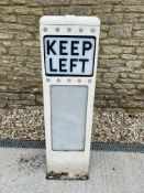A metal Keep Left bollard, 44