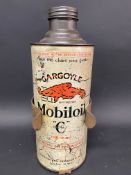 A Gargoyle Mobiloil quart can on a bulkhead bracket.