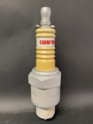 A Champion spark plug shaped hanging advertisement, 18 1/2