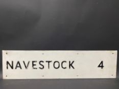 A single sided road sign for Navestock, 28 x 7