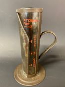 An Atomol two stroke glass and metal measure.