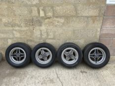 A genuine set of four RS 2000 four spoke wheels, manufactured 1979, 13 x 6J, centre