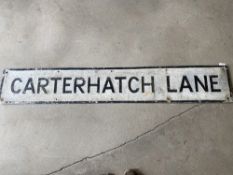 A street name sign for Carterhatch Lane, 56 x 9