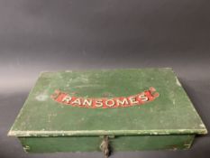 A wooden lidded box bearing the brand name of Ransomes, containing a selection of metal and