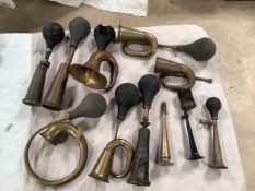 Eleven bulb horns including 'King of the Road'.