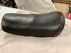 A believed Norton dual seat with metal base, good restored condition.
