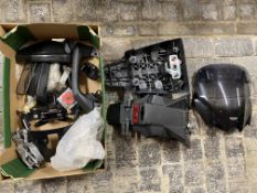 A quantity of various parts for a Kawasaki Versys.