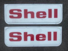 A pair of Shell lightbox panels, each 42 1/2 x 15