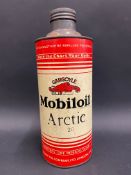 A Gargoyle Mobiloil Arctic Grade quart cylindrical oil can.