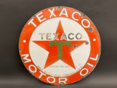 A Texaco Motor Oil circular enamel sign, 25 3/4