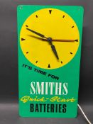 A Smiths Quick-Start Batteries wall clock, 9 x 16 1/2
