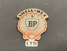 A Shell-Mex & BP Ltd. lapel badge.