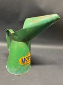 A Morris's of Shrewsbury Golden Film Lubricants quart measure.