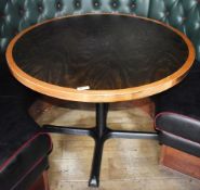 1 x Round Restaurant Table With a 105cm Diameter - Features a Two Tone Wooden Top and Cast Iron Base