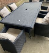 1 x Dark Rattan Outdoor Table With Six Chairs and Cushions