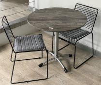 1 x Round 80cm Wooden Driftwood Table With Chrome Base and Two Contemporary Chairs With Seat