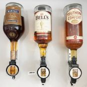 3 x Large 1.5L Bottles of Various Spirits Including Bells Whisky, Southern Comfort and Martell