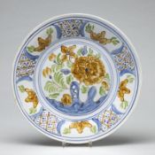 Teller - Blumenmalerei. De Porceleyne Claeuw, Delft um 1800.