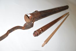 A vintage Hiolle two-piece pool cue with textured grip and inlaid mother of pearl detail with an