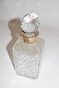 A cut clear glass octagonal decanter with silver hallmarked collar, Sheffield 1984, 24cm high