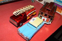 Mixed Lot : a model San Francisco tram coach, a small Chinese metal plate fire engine and a