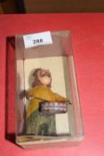 Vintage clockwork toy monkey which plays a drum, approx 10cm high