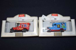 2 Liedo Die-cast models Dennis the menace blue vand and Despriate Dan Red Van