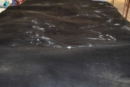 Black shaggy floor rug, width approx 200cm