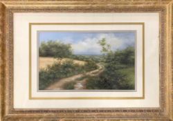 British School, 20th Century, A lone figure in an open landscape, signed 'Whitfield',11x19ins,