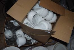 Three boxes containing milk jugs, glass ware, serving dishes etc