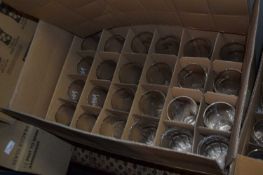 Box containing 24 mixed branded pint glasses to include Abbott Ale and Coca Cola etc