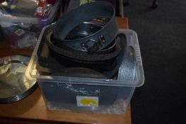 Box containing mixed cake tins, flan cases etc