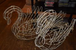 Pair of illuminated garden decorations formed as swans