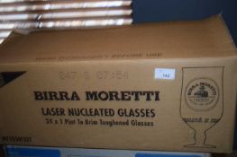 Box containing mixed branded half pint glasses to include Kronenbourg and Moretti, approx 18