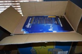 Box containing 24 Fosters branded pint glasses together with advertising posters