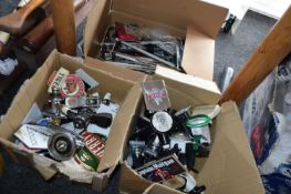 2 boxes containing a quantity of optics with advertising display signs