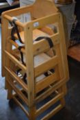 3 light stained childrens highchairs, overall height approx 75 cm, maximum width approx 50 cm x 30