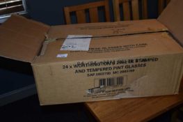 Box containing 18 branded Guinness pint glasses