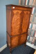 Veneered drinks cabinet height 150cm, width 66 cm, depth approx 40 cm