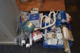 2 crates containing mixed and various light bulbs, plugs and electrical spares