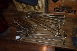 Quantity of bar overhead wine glass holders