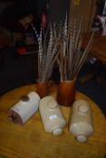 Mixed lot: stone ware hot water bottles, pheasant feathers and pottery jugs